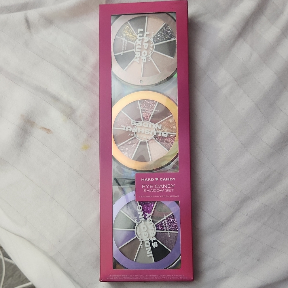 Hard Candy Eye Shadow Palette with Purple, Pink, and Gold